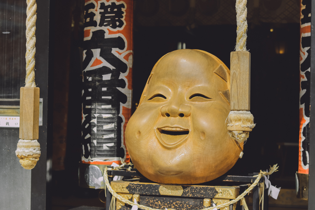 Statue of Nade Okame at the altar of Otori Shrine