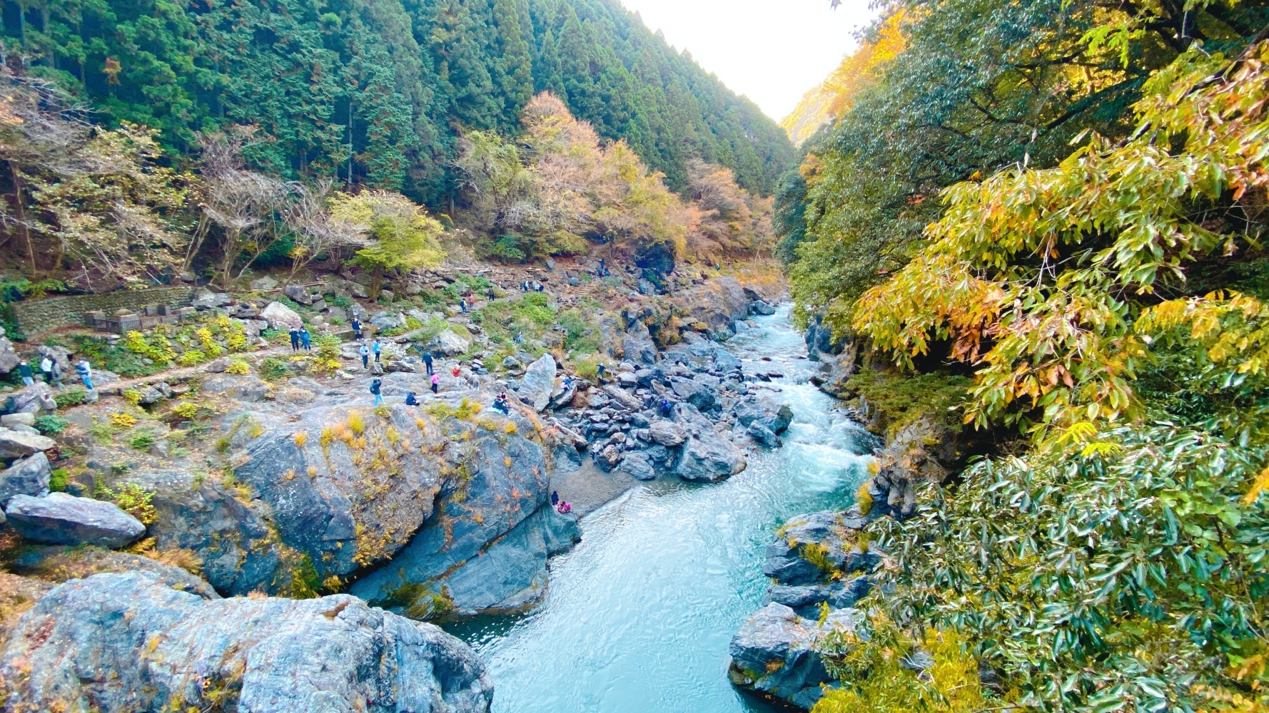 Tama River gushing through craggy rocks at Hatonosu Valley