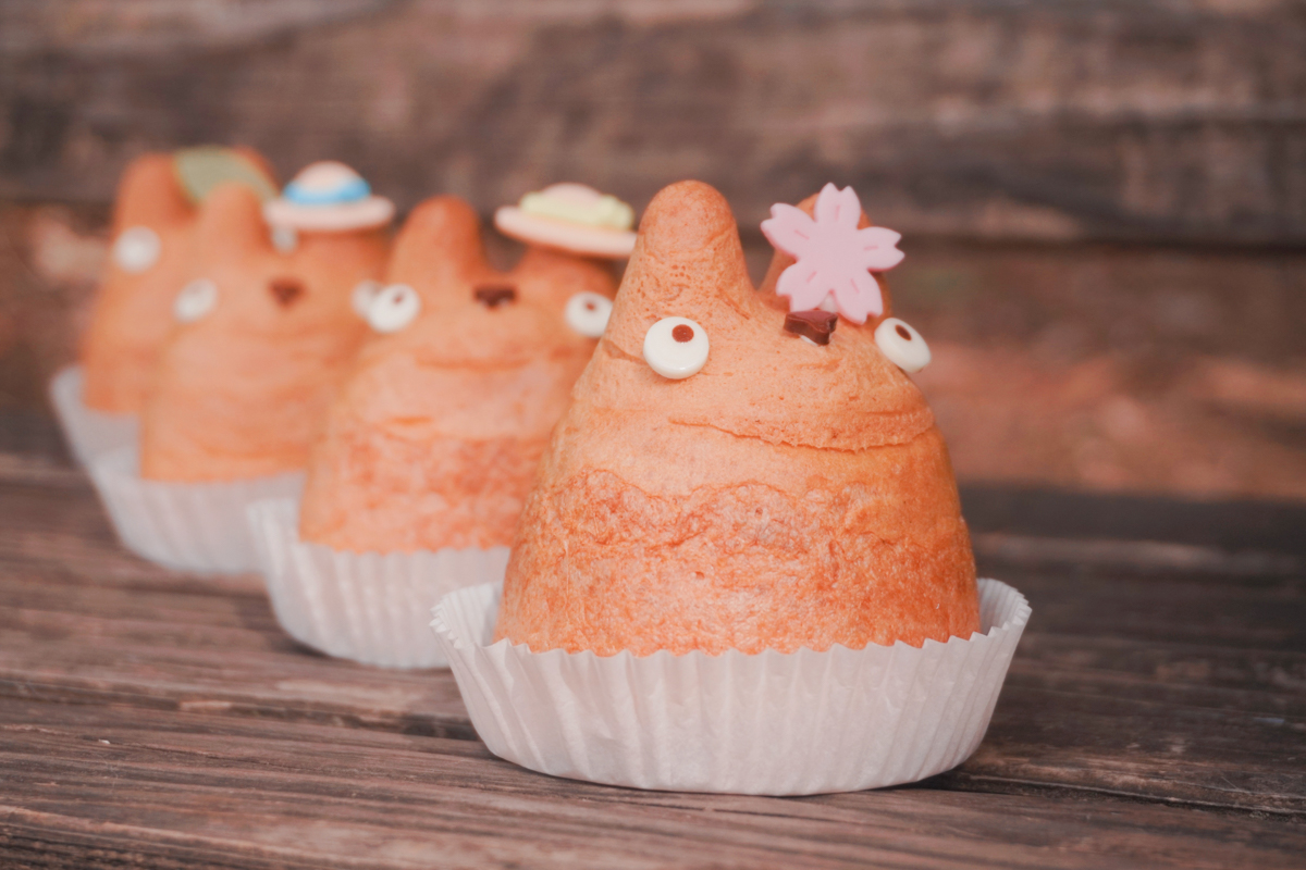Totoro Cream Puffs lined up on a bench at Inokashira Park